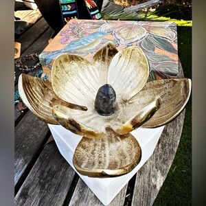 Gold magnolia flower sculpture